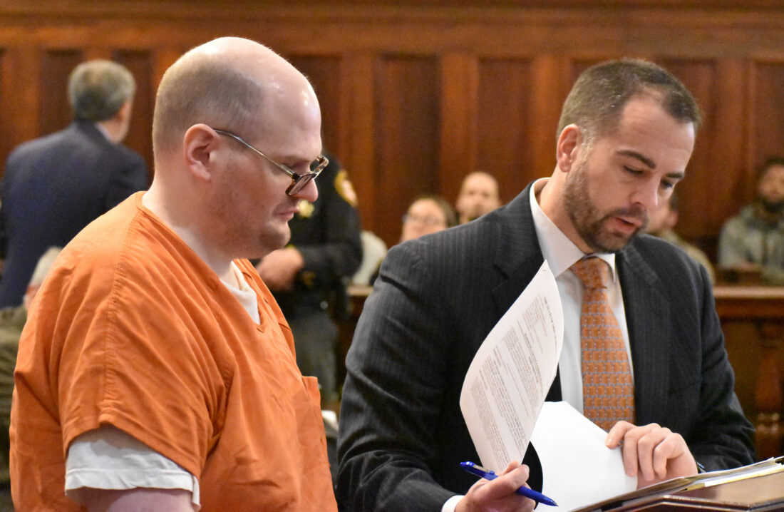 Nicholas Cunningham, left, stood with his attorney, Michael Kivlighan, during a hearing in November in Mahoning County Common Pleas Court. Cunningham is charged with aggravated murder and other offenses in the Oct. 26, 2023, killing of Gena Wade at her home in Smith Township. (Photo by Ed Runyan)